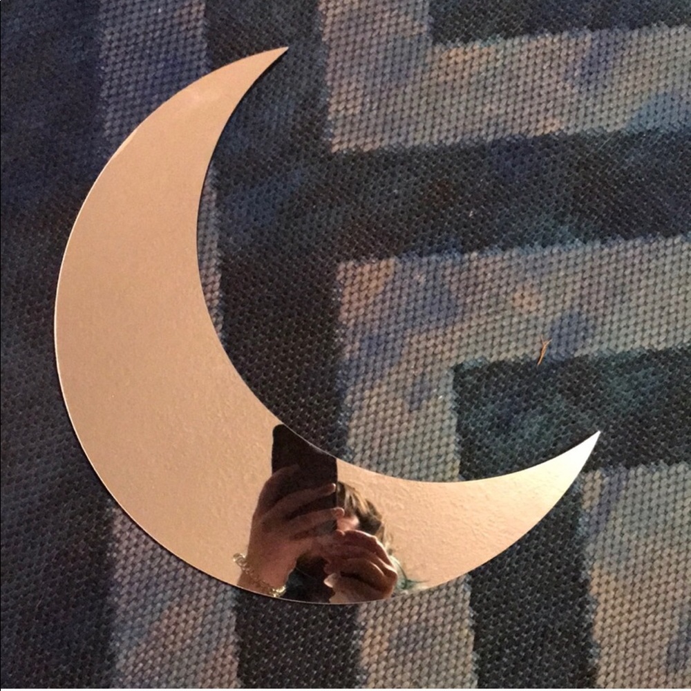 Moon shaped mirror